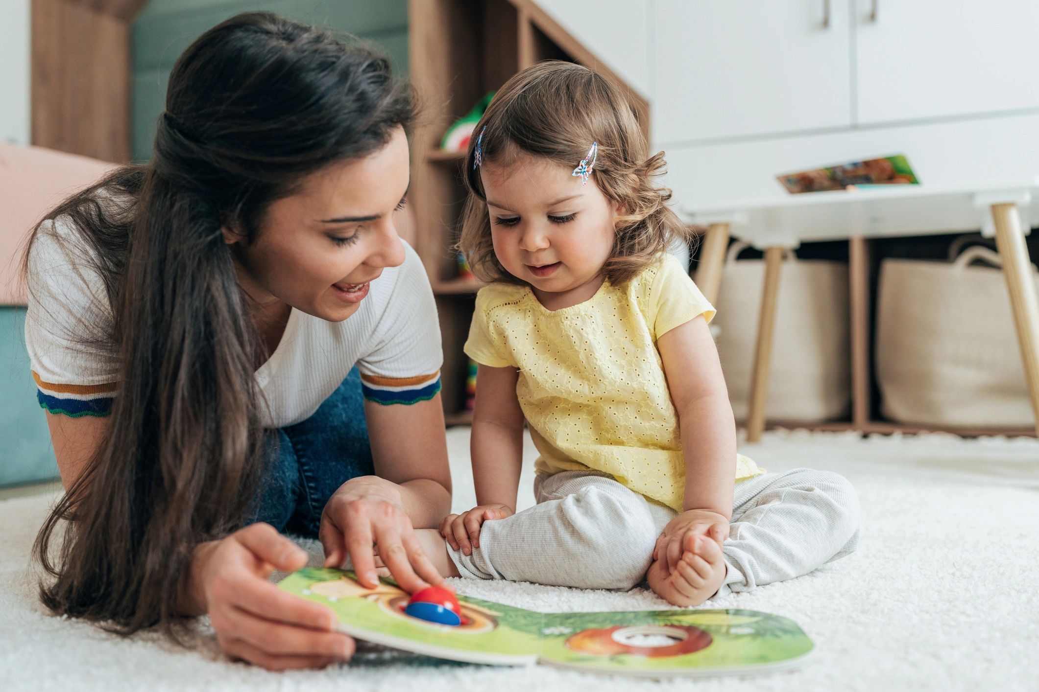 Caregiver reading with a child